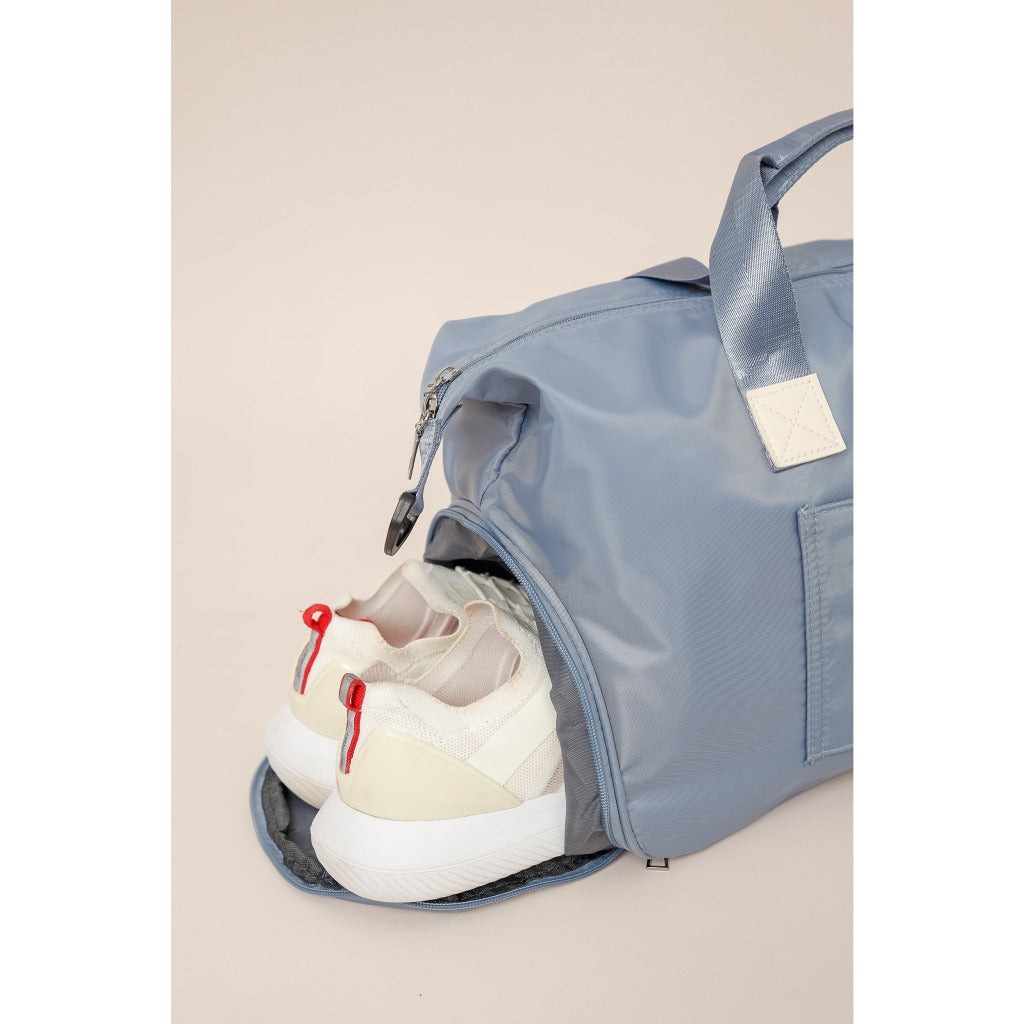 Maleta deportiva para mujer con manija integrada para colocar en una maleta de equipaje rondate, color azul claro, DCVS